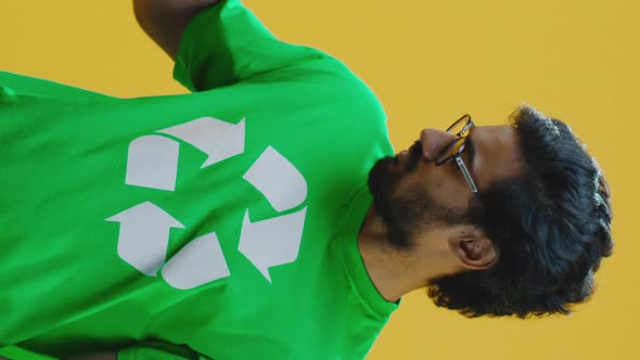 Eco-conscious Man Putting Bottle Into Bucket