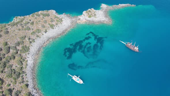 4k Aerial view of boats, Yacht in the bay sea in Fethiye Turkey,Summer vibes, Amazing turquoise sea