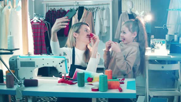 Female Designer and Her Daughter are Fooling Around