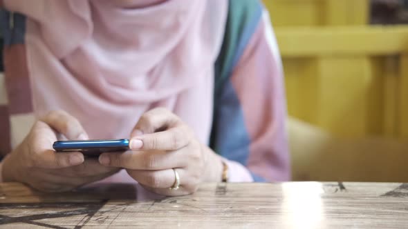 Close Up of Women Hand Holding Smart Phone