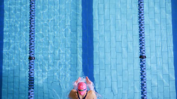 Swimmer training in a swimming pool