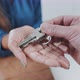 Hand of a young women receiving keys cloe up - VideoHive Item for Sale