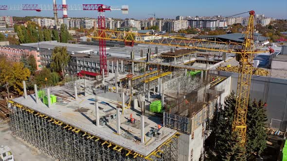 Construction site with cranes. Aerial view of construction site with crane and building