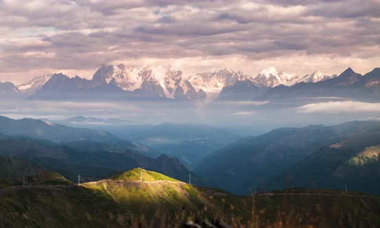 Landscape Timelapse of Sunrise in Autumn Mountains with Rays of Sun Light and Clouds 