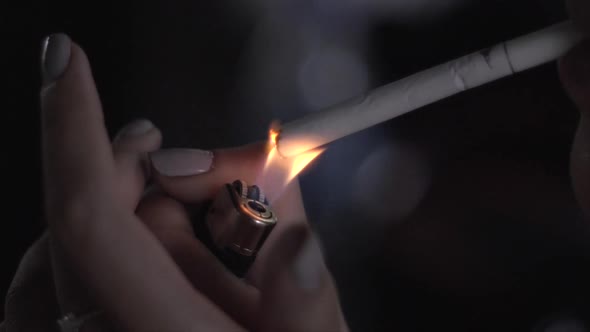 lighting a cigarette in slow motion