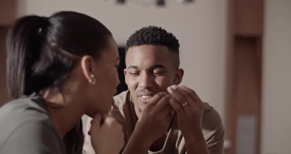 Multiracial Couple Talking at Home