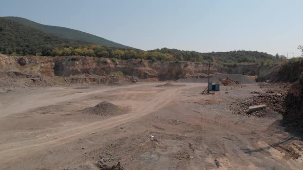 Landscape of an Abandoned Sandy Quarry on a Summer Day