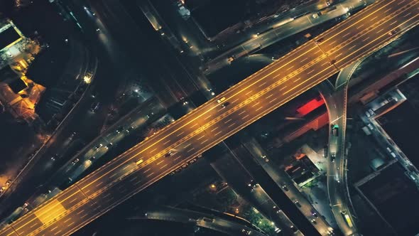 Top Down Aerial of Night Traffic Highway at Illuminated Streets Closeup