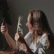 Woman with Fern Taking Selfie on Mobile Phone at Home - VideoHive Item for Sale