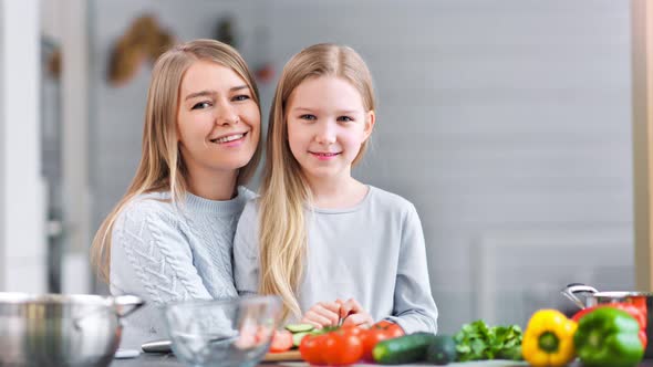 A Closeup Video of a Happy Mother and Daughter Spending Some Quality Time Together in a Kitchen