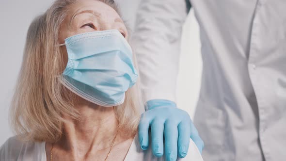 Portrait of an Old Woman in Nursery Home During Covid19