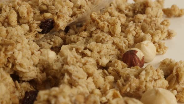 Sweet healthy muesli with  hazelnuts 4K 2160p 30fps UltraHD tilting footage - Organic breakfast with