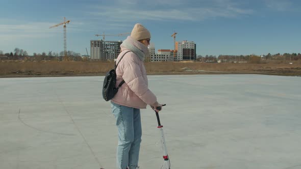 Happy Woman On Kick Scooter