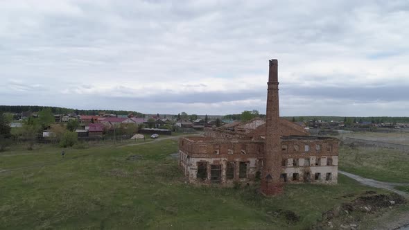 Aerial view of old brick ruined building with a brick pipe 02