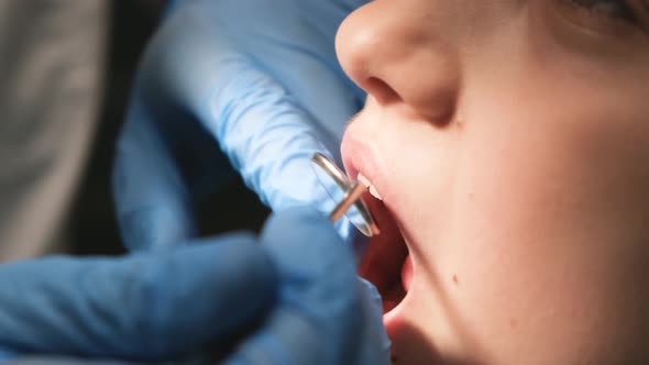 Little Girl Patient Visits a Specialist in a Dental Clinic