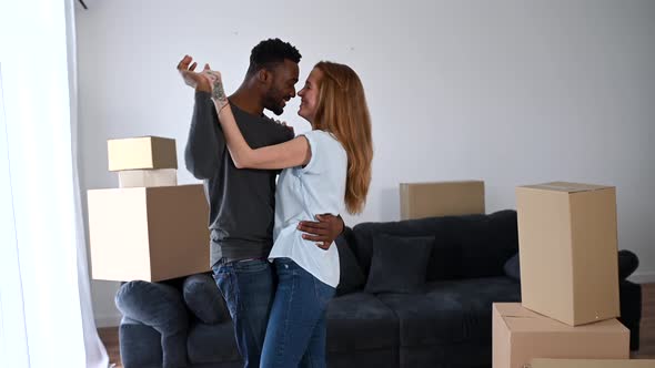 Happy Multiracial Couple Moved in a New House