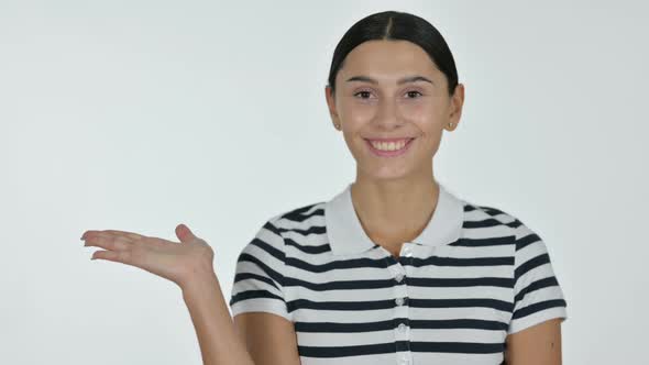 Latin Woman Holding Product on Hand, White Background