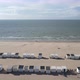 Flying over the beach with cabins. Cote d'Opale, northern France - VideoHive Item for Sale