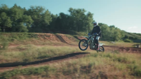 Man Riding Motorcycle on Off-Road Track