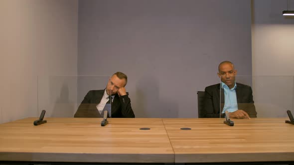 Two Colleagues Behind Empty Glass Futuristic Displays. Ready for Tracking.