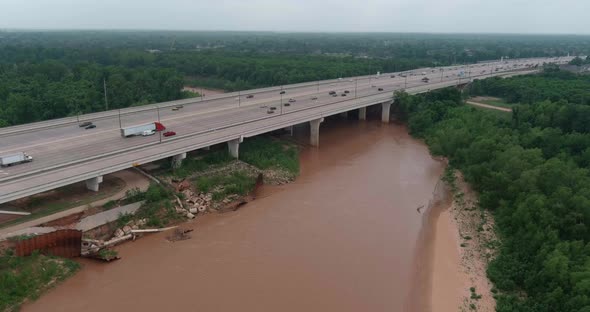 Aerial of cars on 59 South as the pass over the Brazos River in Sugarland, Texas.