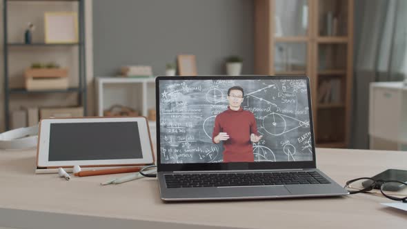 Unrecognizable Person Watching Scientific Video Lecture