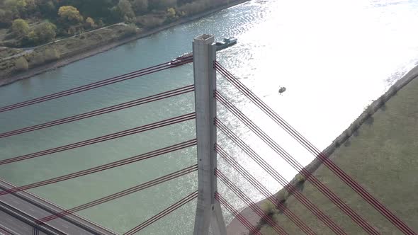 Aerial View of a Cable Stayed Suspension Bridge Crossing a River