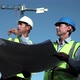 Mature Men Inspecting Blueprints on Construction Site - VideoHive Item for Sale