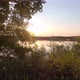 Colorful and Dramatic Sunset Over a Natural Forest Lake Landscape - VideoHive Item for Sale