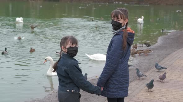 Autumn walk in medical mask.