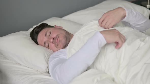 Insomniac Middle Aged Man Unable To Sleep in Bed 