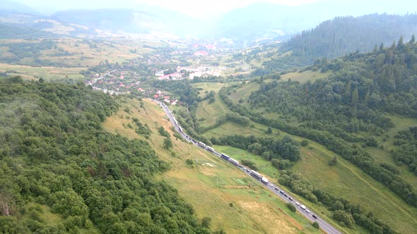 Aerial View of Traffic on the Road in Mountains