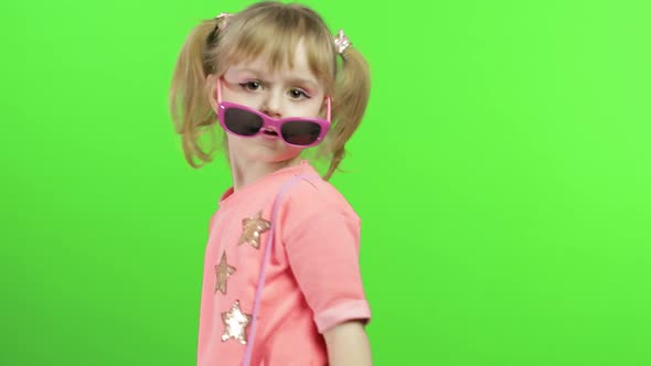 Positive Girl in Pink Blouse and Sunglasses Dancing and Posing. Chroma Key