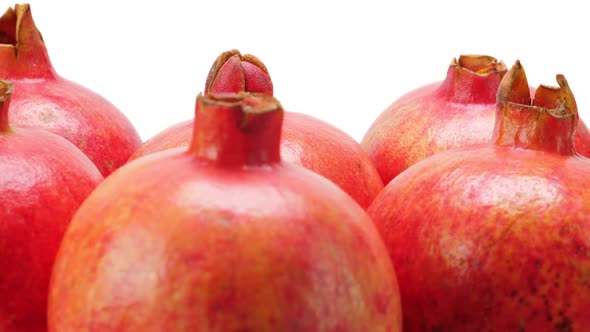 Red Whole Pomegranates. Rotating