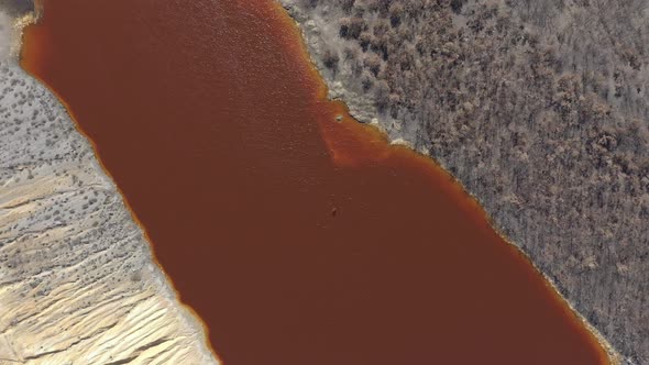 Red water acidic pollutant from above 4K drone footage