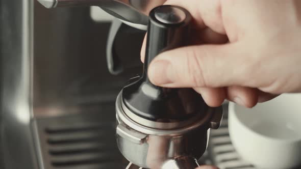 Grinder Stuffing Roasted Coffee from Coffee Machine