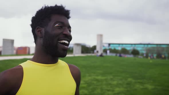 Happy African gay man celebrating pride festival - LGBTQ community concept