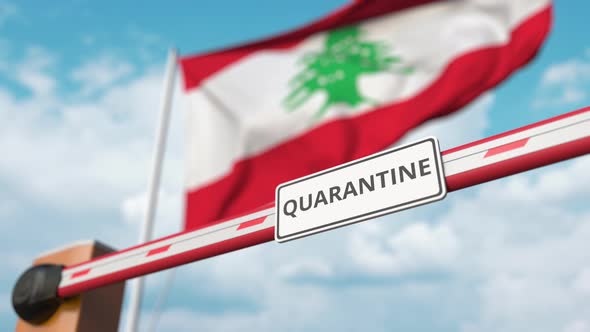 Opening Boom Barrier with QUARANTINE Sign at the Lebanese Flag
