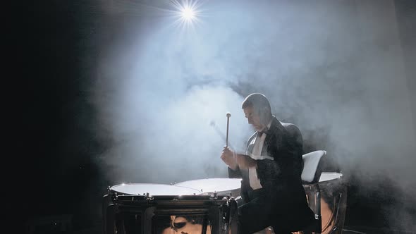 Musician Playing the Timpani