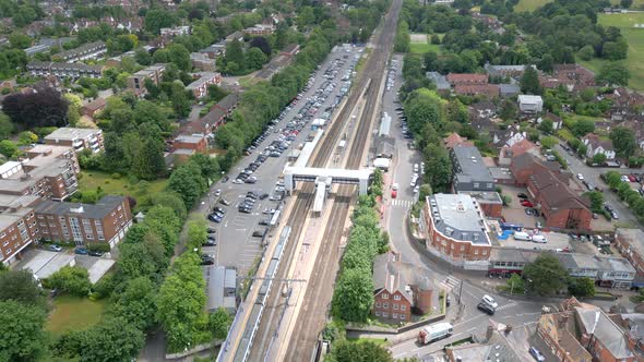 Commuter Trains at a Station in the UK Aerial Time Lapse