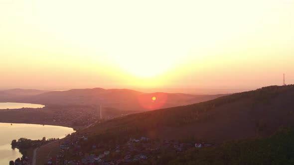 Mountainous terrain at sunset