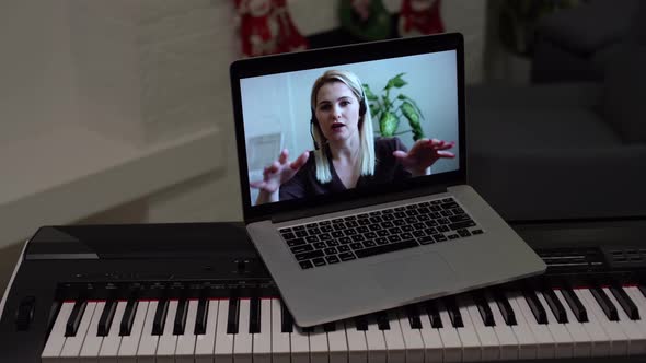 Christmas Time Laptop on Piano Keys