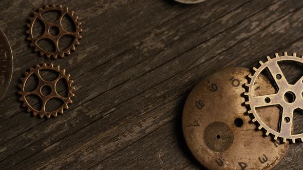 Rotating stock footage shot of antique and weathered watch faces 