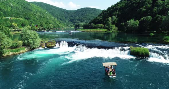 Aerial view of a boat sailing the Una River, Croatia.