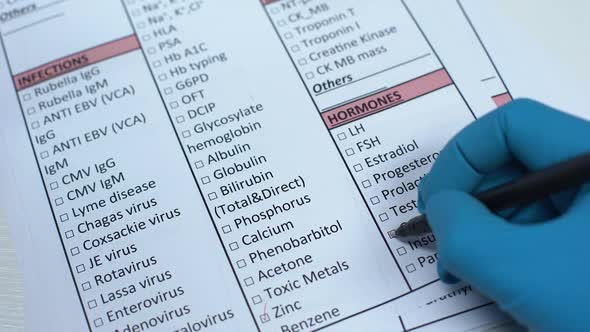 Growth Hormone, Doctor Checking Name in Lab Blank, Showing Blood Sample in Tube