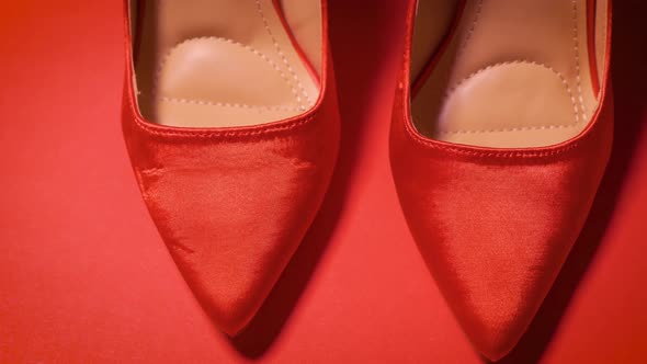 Beautiful Red High Heel Shoes on a Minimalist Background