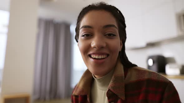 Happy Millennial Biracial Female Have Webcam Digital Online Talking to Camera
