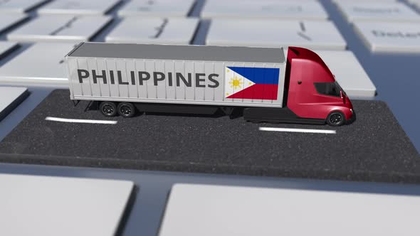 Truck with Flag of the Philippines Moves on the Keyboard