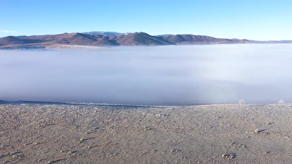 Aerial Drone Above View of Clouds in a Misty Winter Morning