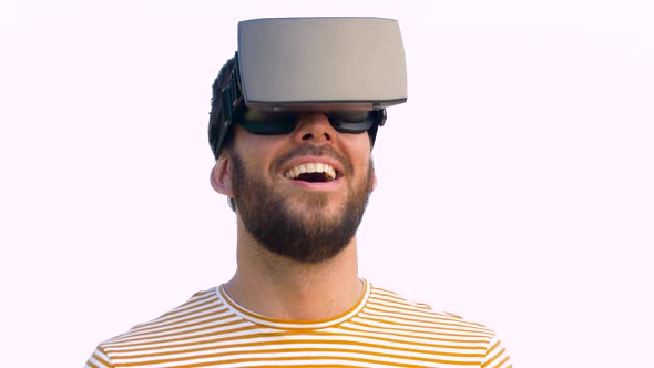 Smiling Man in Virtual Reality Headset Outdoors